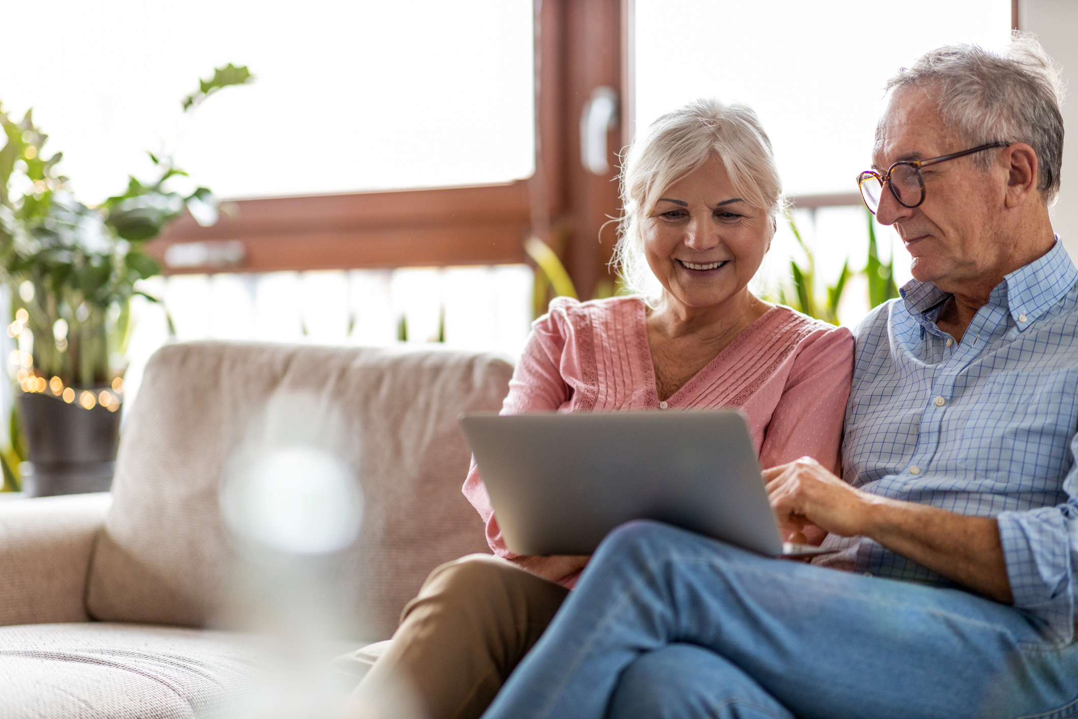 Couple using a laptop