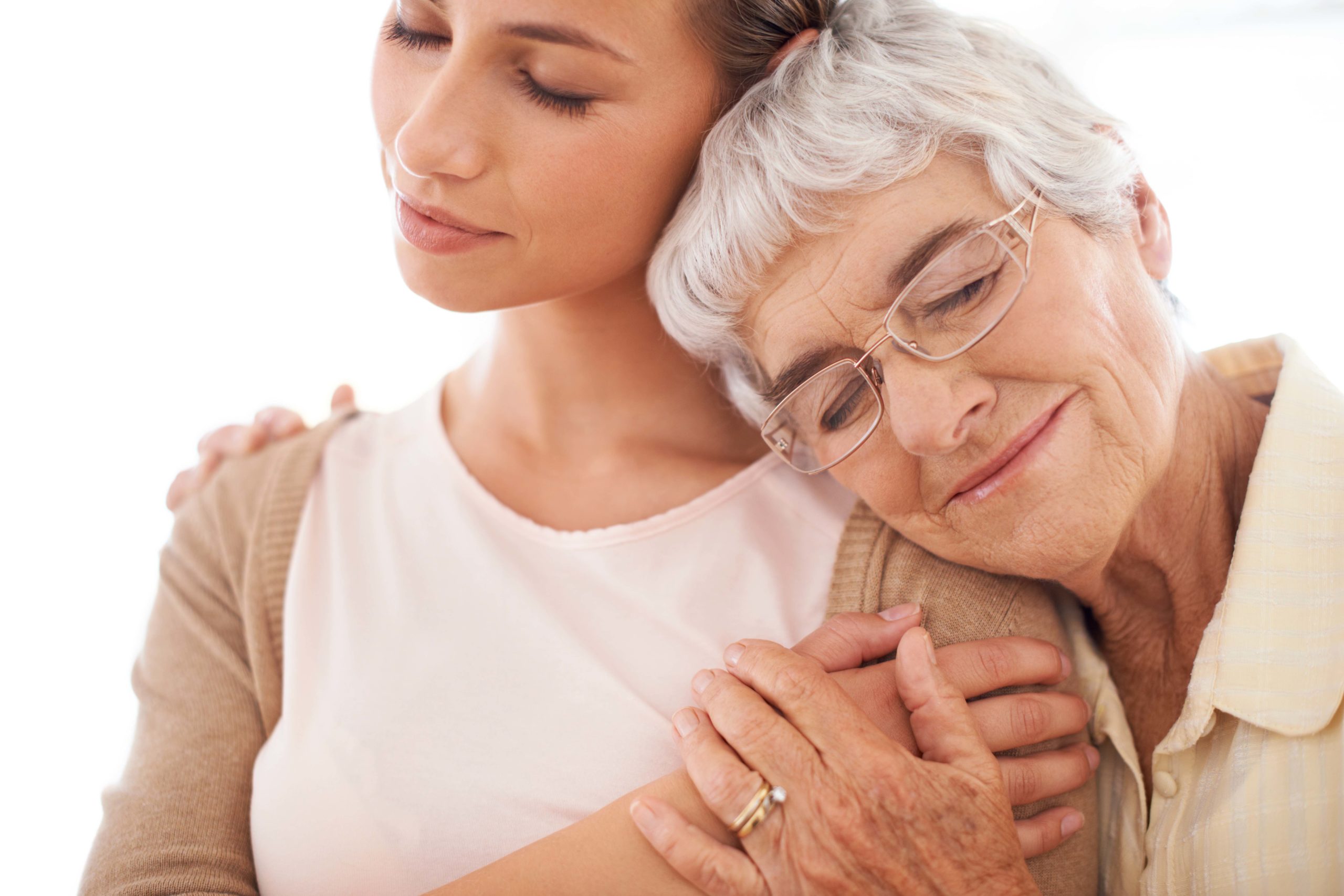 Woman embracing mother